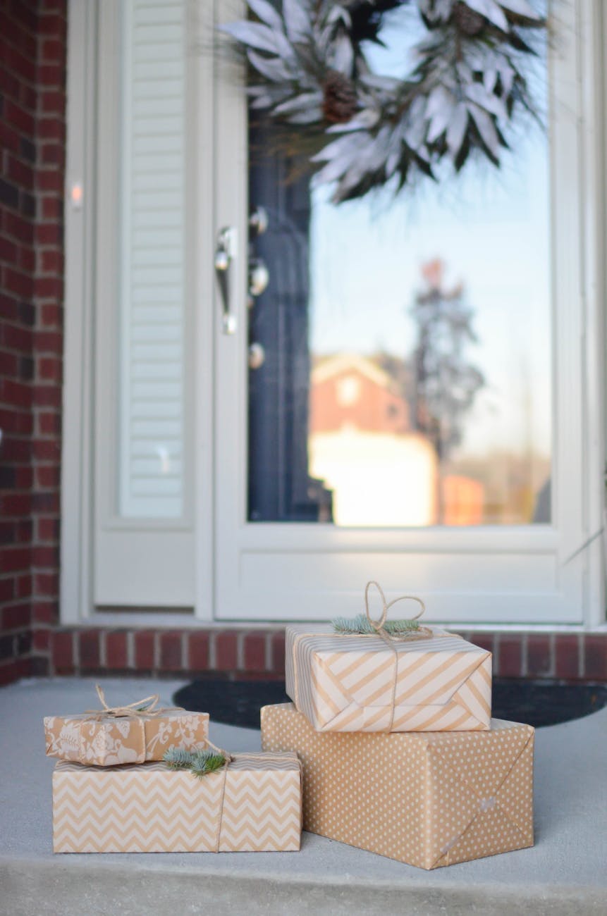 three beige colored boxes on the floor