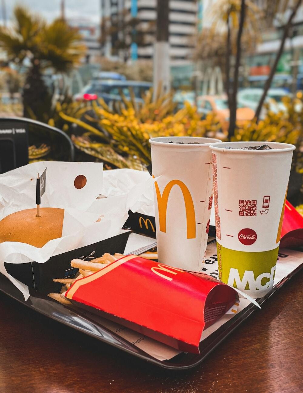 hamburger and drinks on a tray
